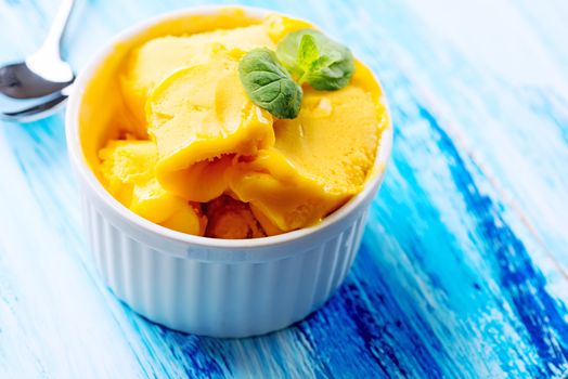 Passion fruit sherbet with mint leaves