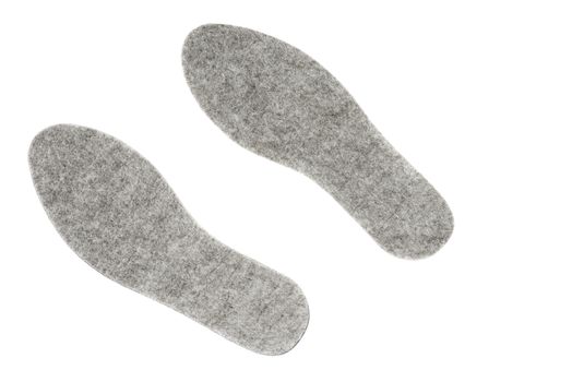 Pair of felt insoles isolated on white background