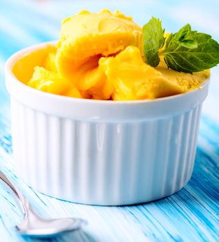 Passion fruit sherbet with mint leaves