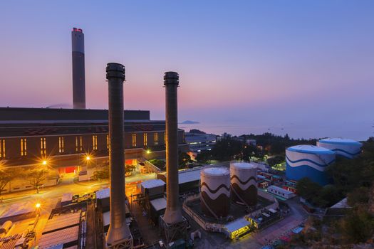 Glow light of petrochemical industry at night, hong kong