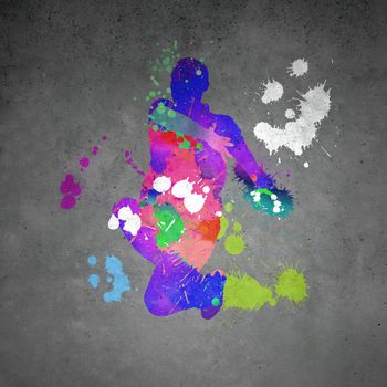 Image with color silhouette of dancer on gray wall