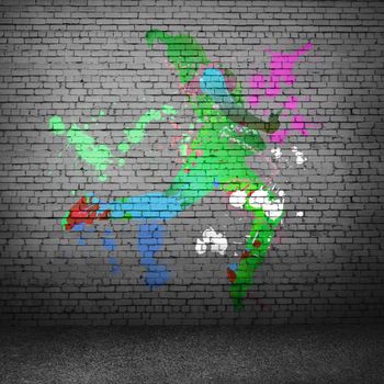 Image with color silhouette of dancer on gray wall