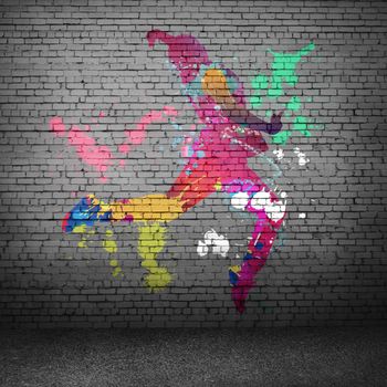 Image with color silhouette of dancer on gray wall