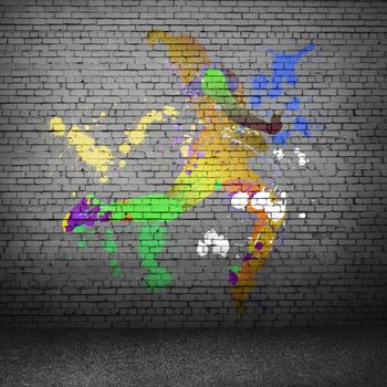 Image with color silhouette of dancer on gray wall