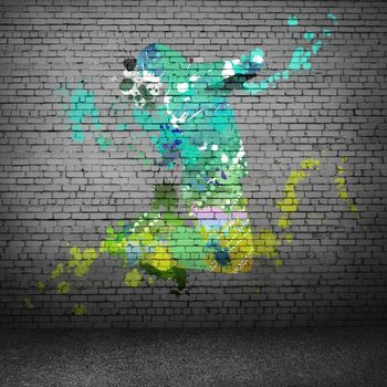 Image with color silhouette of dancer on gray wall