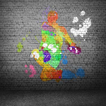 Image with color silhouette of dancer on gray wall