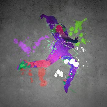 Image with color silhouette of dancer on gray wall