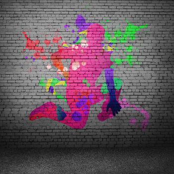 Image with color silhouette of dancer on gray wall