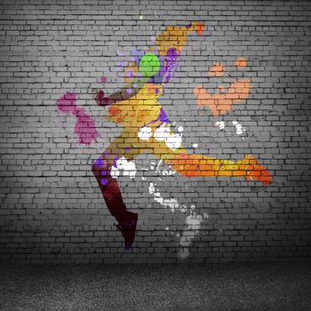 Image with color silhouette of dancer on gray wall