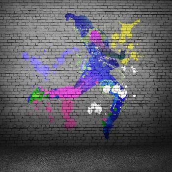 Image with color silhouette of dancer on gray wall