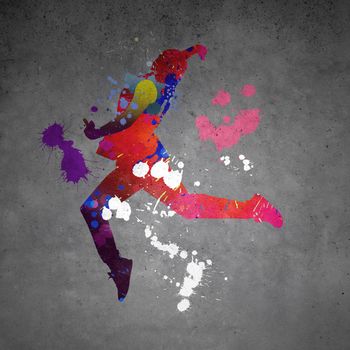 Image with color silhouette of dancer on gray wall