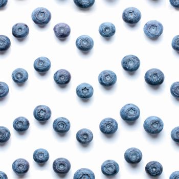 Beautiful trendy seamless pattern blueberries. Blueberry pattern isolated on white background. Blueberry border design. Top view or flat lay