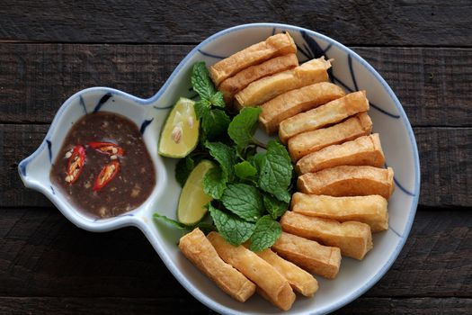 Home made food for family meal, fried tofu with shrimp paste, a very popular food, cheap and delicious at Vietnam