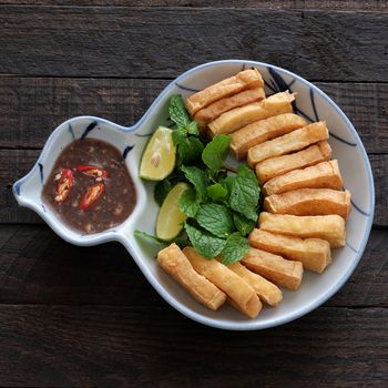 Home made food for family meal, fried tofu with shrimp paste, a very popular food, cheap and delicious at Vietnam