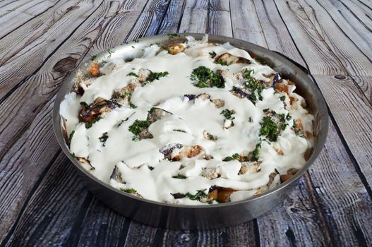 baked pasta with eggplant, bread and parmesan cheese
