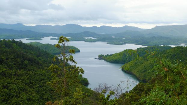 Amazing ecosystem of Ta Dung lake with wonderful shape of hill around lake, green forest on mountain chain need to preserves for environment in climate change situation nowadays