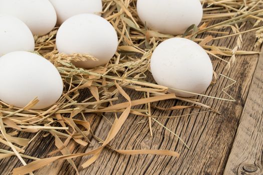 Eggs on wooden background. Selective focus.