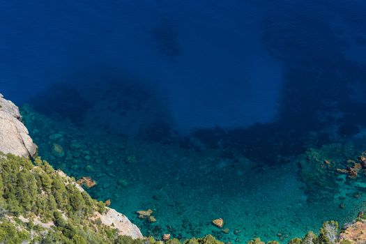 Sea rocks and transparent sea.