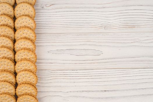 Cookies on the old wooden table. Top view.