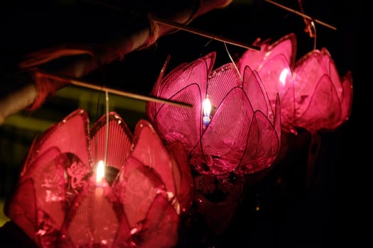 Red lantern with light from candle hang on the wall at night in mid autumn festival, a traditional culture of Viet Nam