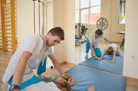 Physical therapist kinetotherapy and pacient