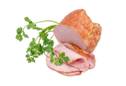 Partly sliced smoked cooked ham with pork loin and a twig of the cilantro on a light background
