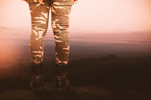 Military women with nature on the mountains.