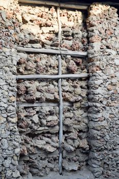 Stone, wood and mud façade in a village in Kenya