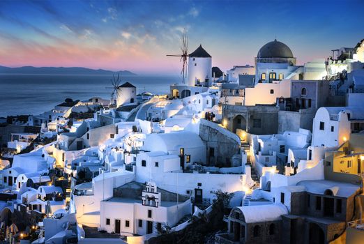 Evening time and view of Oia village on Santorini island, Greece.