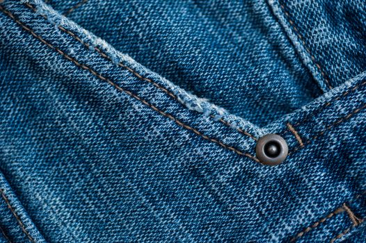 texture of jeans, stitching on the pants closeup.