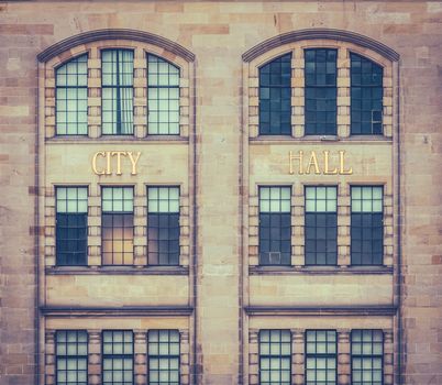 Retro Style City Hall Sign On A Old Facade