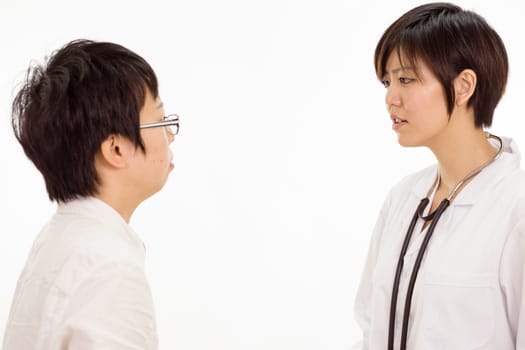 Chinese female doctor talking to patient