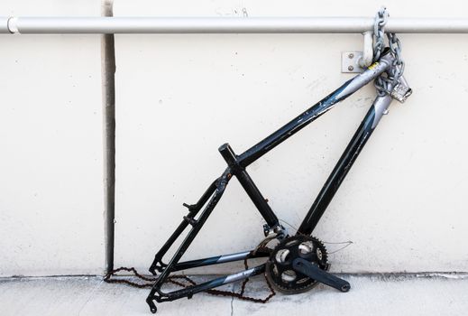 Chaining a bicycle did not prevent thieves from stealing parts like wheels from it.