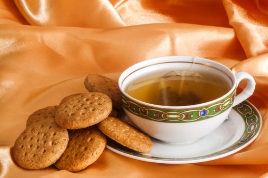   ginger and orange tea and wholemeal biscuits