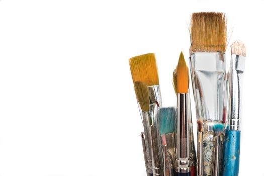 Artist paint brushes. Isolated with copy space