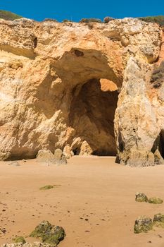 Cave on the beach of Praia da Rocha, Portimao Coast. Algarve region. Portugal
