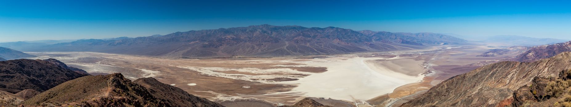 Dante's View is a viewpoint terrace at 1,669 m (5,476 ft) height, on the north side of Coffin Peak, along the crest of the Black Mountains, overlooking Death Valley. Dante's View is about 25 km (16 mi) south of Furnace Creek in Death Valley National Park.
