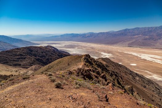 Dante's View is a viewpoint terrace at 1,669 m (5,476 ft) height, on the north side of Coffin Peak, along the crest of the Black Mountains, overlooking Death Valley. Dante's View is about 25 km (16 mi) south of Furnace Creek in Death Valley National Park.