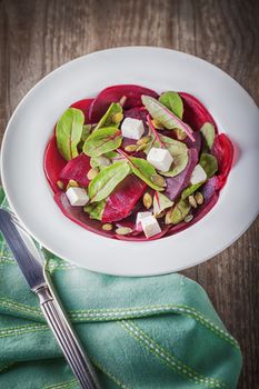 Salad with beetroot, goat cheese and chard.