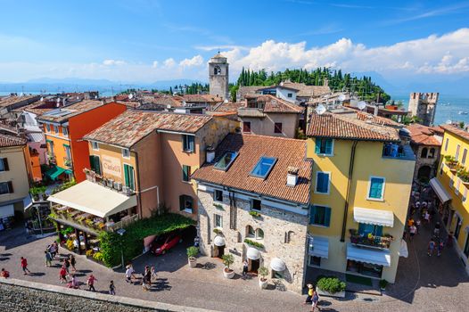 Sirmione, province of Brescia, Lombardy, northern Italy - 15th August 2016: view to the old roofs of Sirmione town on lake Lago di Garda