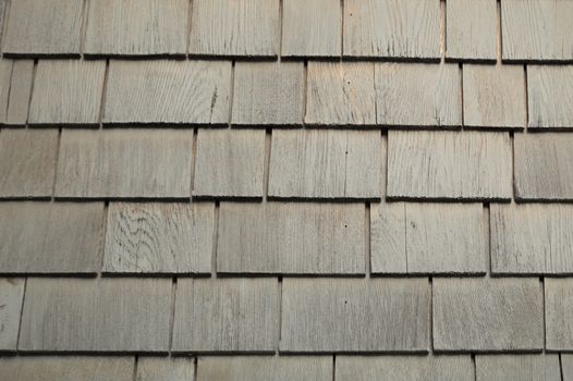 Neat. tidy. newer grey cedar shakes shingles background