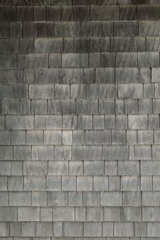 Neat. tidy. newer grey cedar shakes shingles background