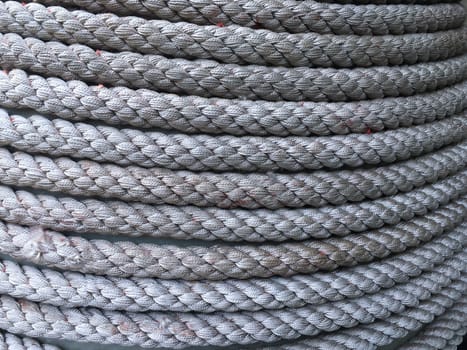 Background of roll of rope. Texture rope closeup.