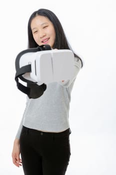 Teenage Asian girl passing 3D goggles