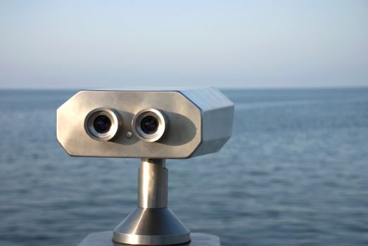 Marine binoculars for tourists at the seaside.