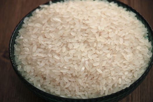 background delicious white rice grains in glass bowls close