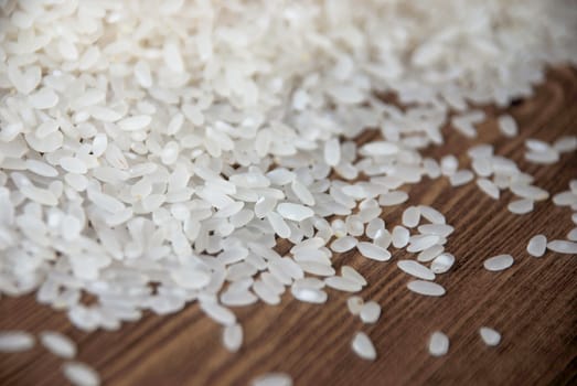 Delicious white rice grains on the table close-up background image