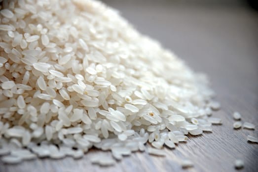 Delicious white rice grains on the table close-up background image