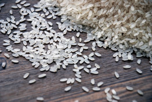 Delicious white rice grains on the table close-up background image