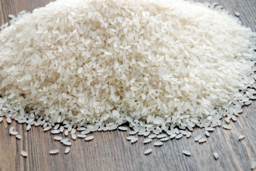 Delicious white rice grains on the table close-up background image